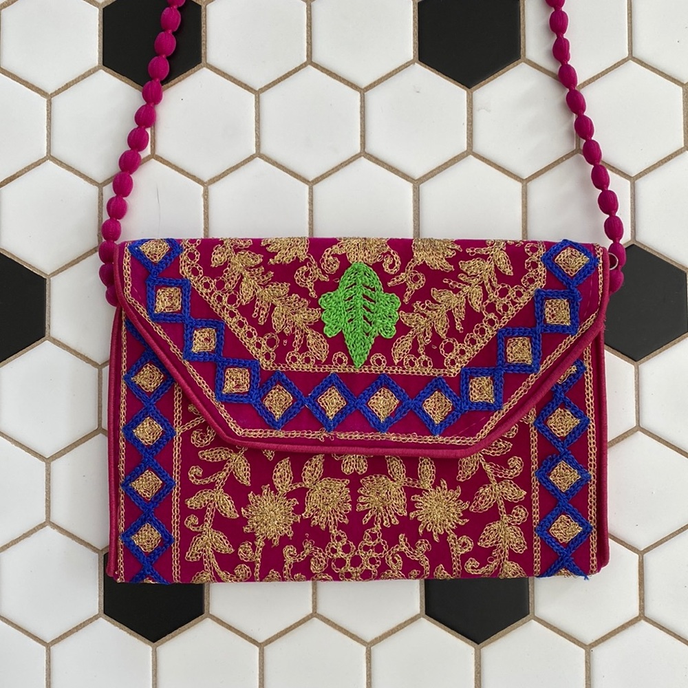 EMBROIDERED PURSE with POM POM CHAIN